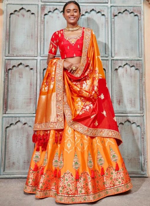 Sensational Orange Jacquard Silk Zari Weaving Designer Lehenga Choli