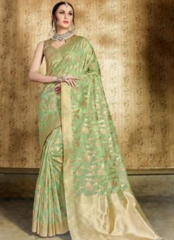Magnificent Green Silk Zari Weaving Party Wear Saree