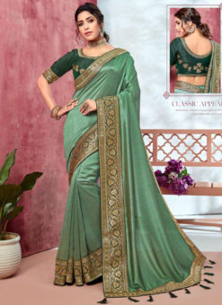 Extravagant Pisat Green Vichitra Silk Embroidered Border Bridal Saree