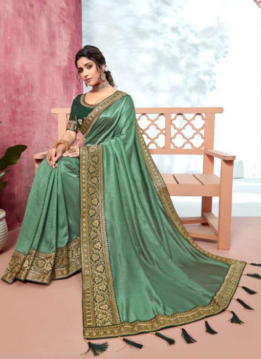 Extravagant Pisat Green Vichitra Silk Embroidered Border Bridal Saree