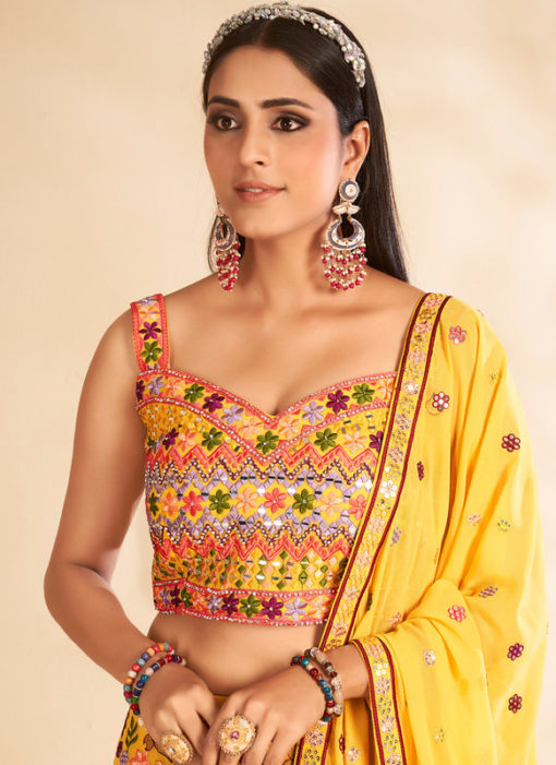 Mustard Designer Embroidered And Printed Party Wear Georgette Lehenga Choli