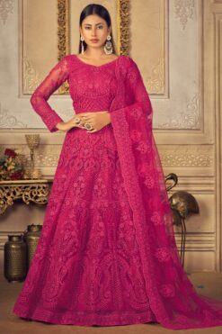 Rani Color Wedding Wear Attractive Embroidered Lehenga Choli In Net Fabric