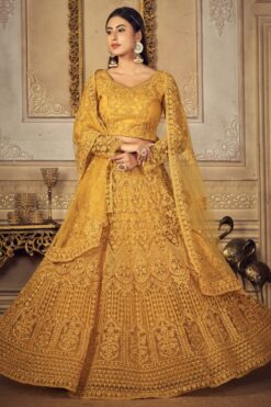 Beautiful Net Fabric Sangeet Wear Embroidered Lehenga Choli In Mustard Color