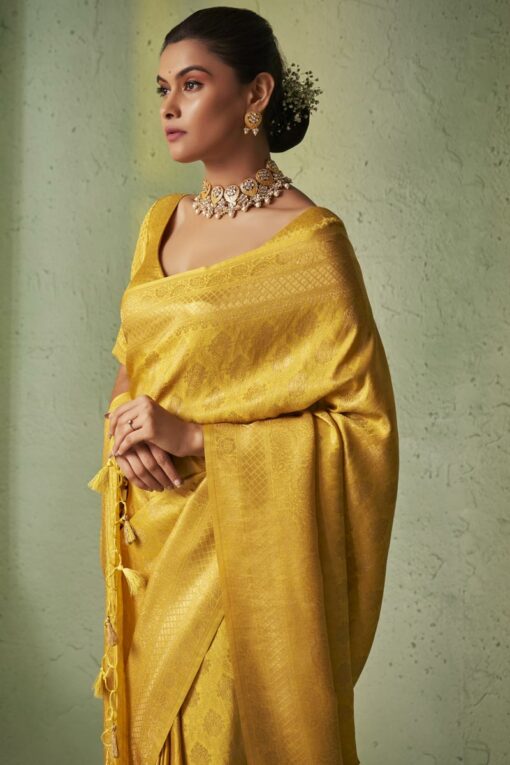 Marvellous Weaving Work On Kanjivaram Silk Saree In Yellow Color