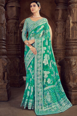 Brasso Fabric Festive Look Classic Saree In Green Color
