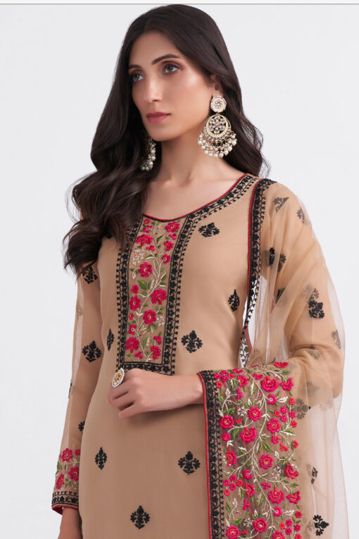 Kanika Dev Riveting Georgette Fabric Salwar Suit In Chikoo Color