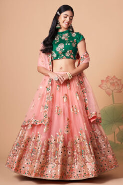 Entrancing Net Fabric Sangeet Wear Lehenga Choli In Peach Color