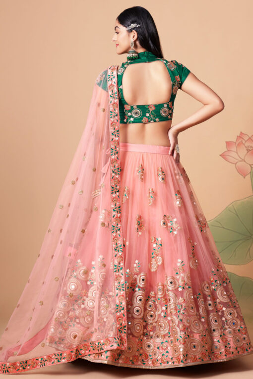 Entrancing Net Fabric Sangeet Wear Lehenga Choli In Peach Color