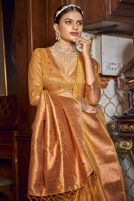 Entrancing Tisuue Fabric Mustard Color Saree With Weaving Work
