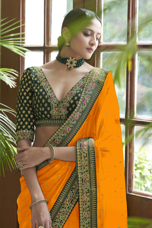Art Silk Traditional Saree In Orange with Embroidered Work