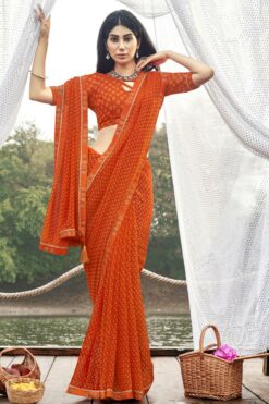 Engaging Orange Color Georgette Fabric Printed Saree